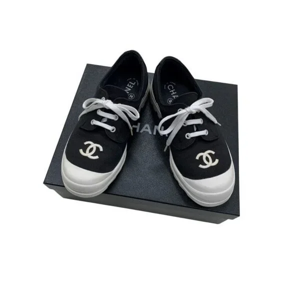 Authentic CHANEL CC Sneakers Black and White Coco Mark Bicolor